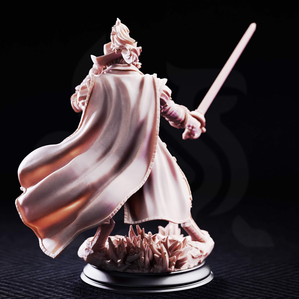Rear view of Puss-In-Boots Tabaxi Fencer by DM Stash, showing the flowing cloak, hat, sword, and scenic base details.