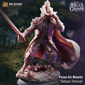 Puss-In-Boots Tabaxi Fencer miniature by DM Stash, showing a stylish feline duelist with a feathered hat, sword, long coat, and dramatic pose on a scenic base.