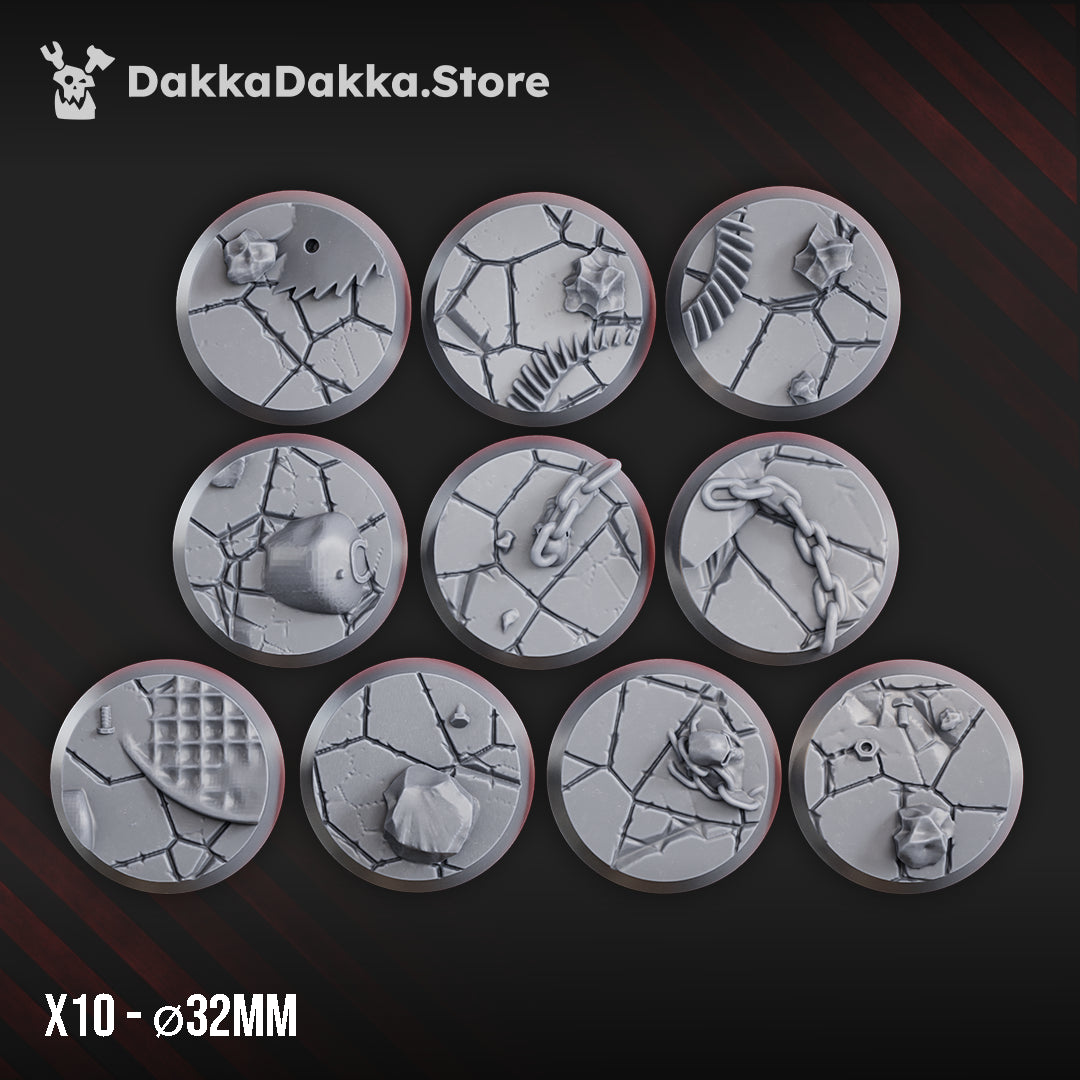 Set of 10 scrap battlefield resin bases by DakkaDakka, showing cracked ground, chains, rocks, metal plates, and sci-fi debris for tabletop miniatures.