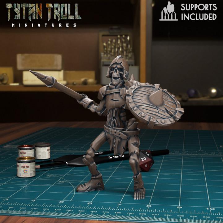 Resin 3D‑printed skeleton warrior miniature by TytanTroll, posed with a spear and round shield.