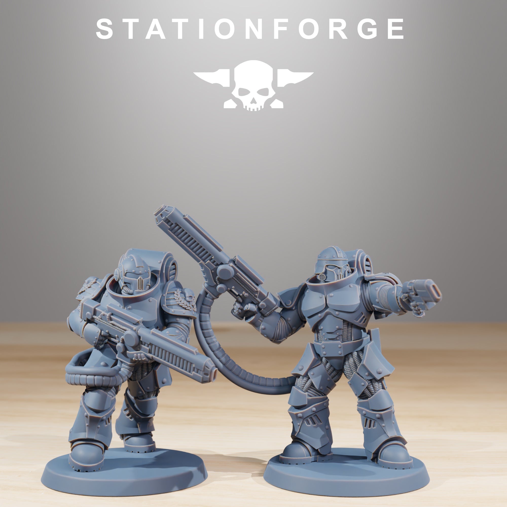 Two Socratis Exterminators sci-fi miniatures with heavy weapons and dynamic action poses.