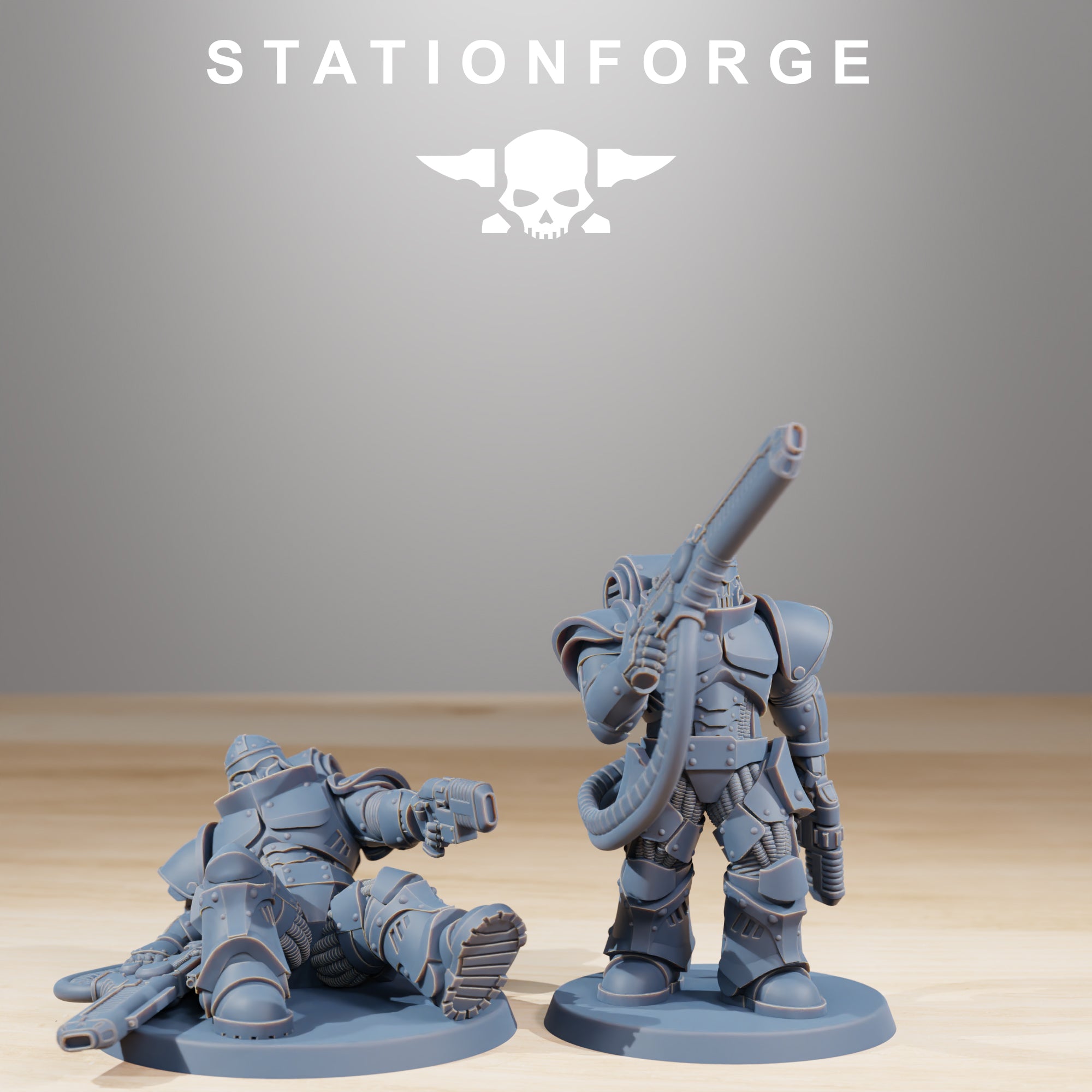 Socratis Exterminators resin miniatures with fallen pose and standing heavy gunner.