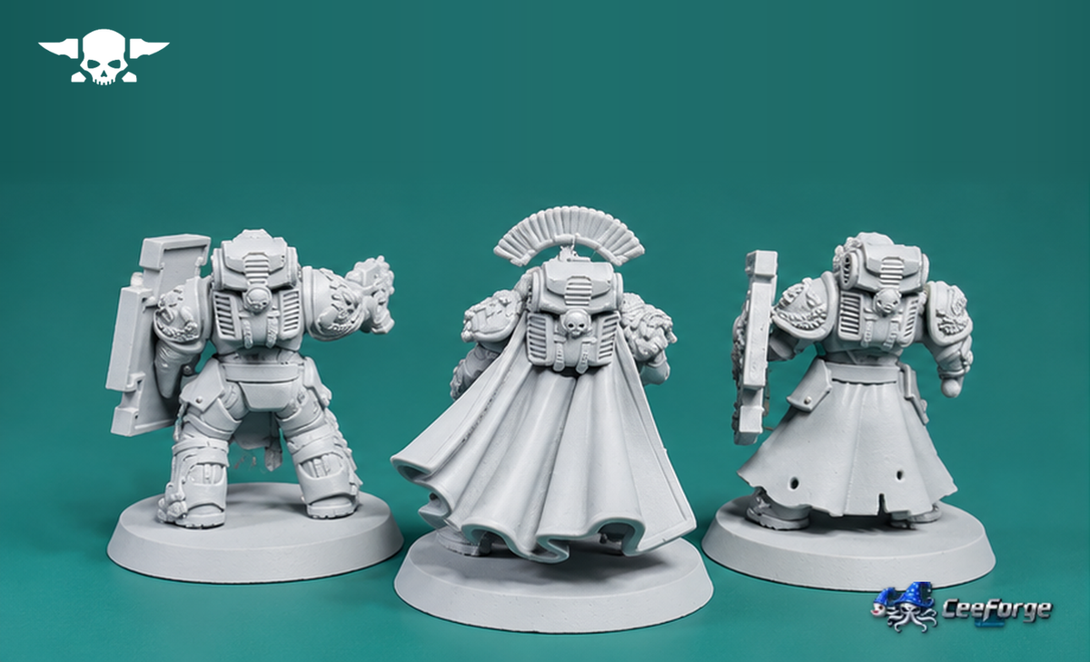 Rear view of three primed Socratis Guardsmen miniatures showing backpacks, sculpted cloaks, and armor details