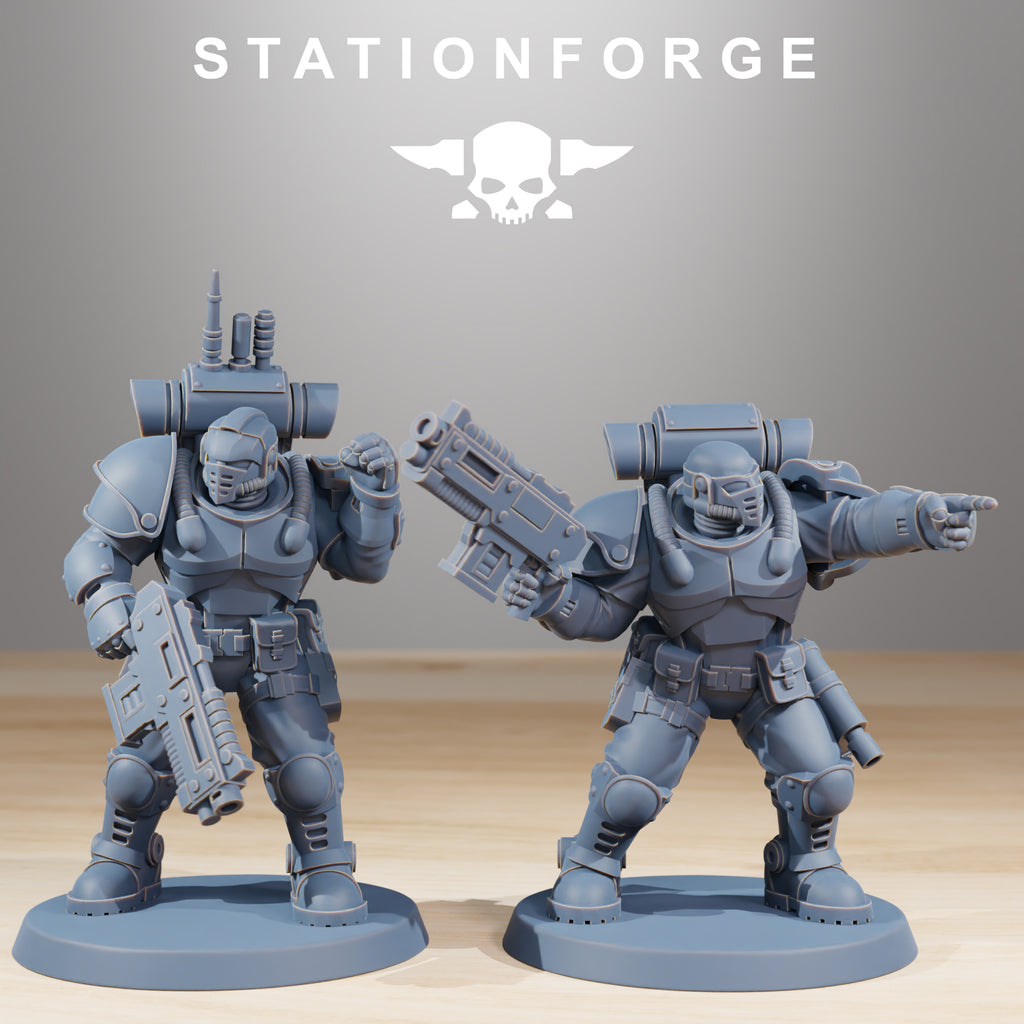 Two Station Forge Socratis Light Infantry miniatures with helmets, rifles, and armored gear.