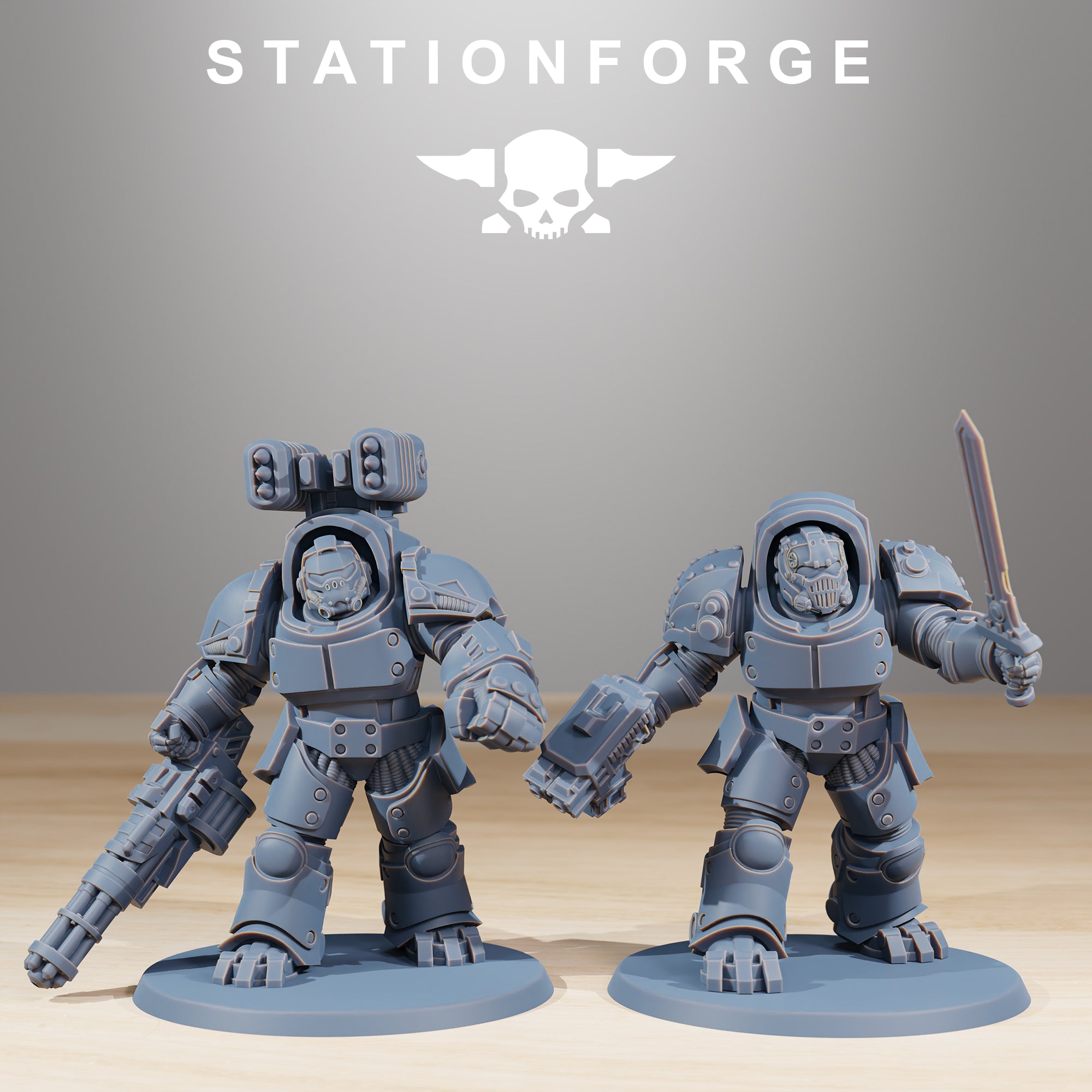 Two Socratis Vanguard sci-fi miniatures with heavy weapons, sword, and bulky armor.