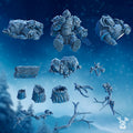 StormBringer base decoration kit by DakkaDakka, showing resin scenic bits with rocks, logs, branches, stumps, debris, and winter fantasy basing details.