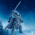 Stormbringers Bob the Mascot miniature by DakkaDakka, shown from the front with hooded armor, raised sword, fur details, cloak, and fantasy warrior styling.