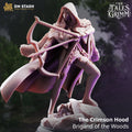 The Crimson Hood Brigand of the Woods miniature by DM Stash, showing a hooded female fantasy hunter with a crossbow, sword, fur cloak, and rocky base.