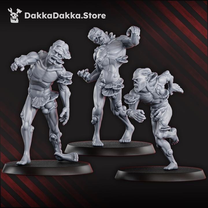 Close-up view of three unpainted Walking Mass undead miniatures, showing their ragged armor, bone details, and varied poses.