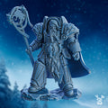 Wan’illa Ice Scream Stormbringer miniature by DakkaDakka, shown from the front with heavy armor, fur cloak, staff, long beard, and scenic icy base.