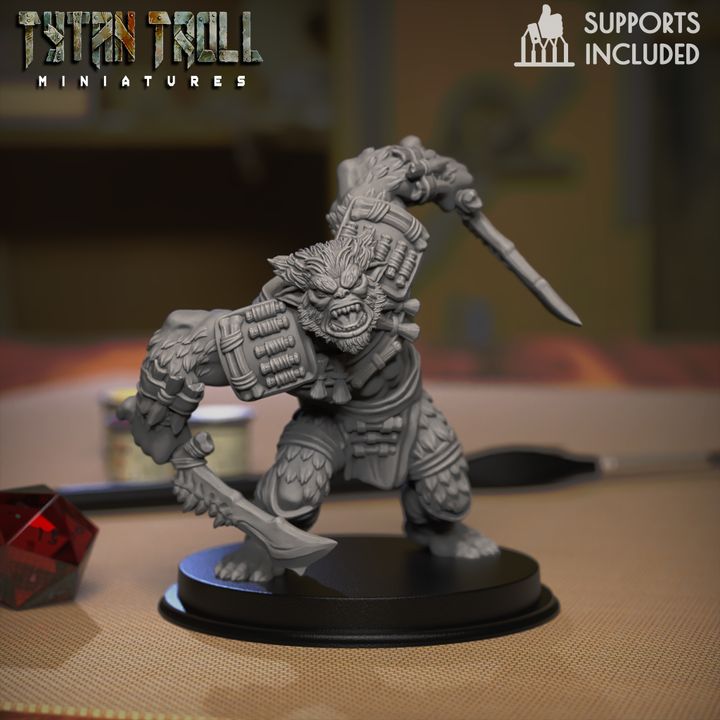 Bugbear warrior miniature with raised axe and knife, sculpted with fur, armor plates, and savage fantasy monster detail.