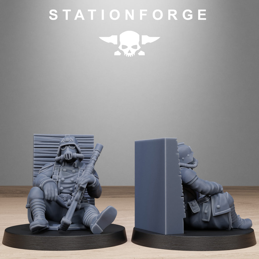 GrimGuard Battlefront resin miniature posed behind a concrete barricade with rifle, gas mask, and trench gear.