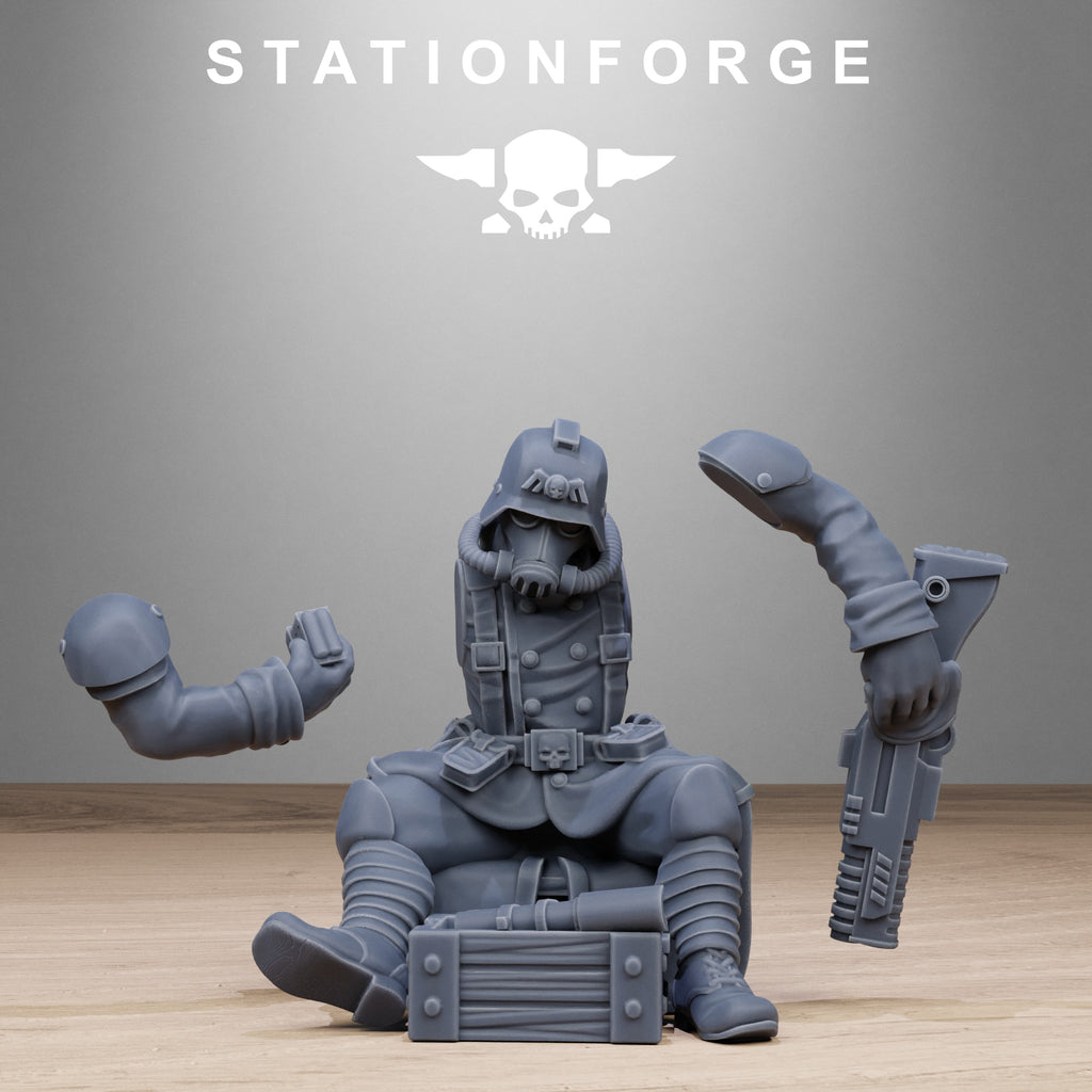 Modular GrimGuard Battlefront resin miniature parts showing body, head, arms, weapons, and alternate assembly pieces.