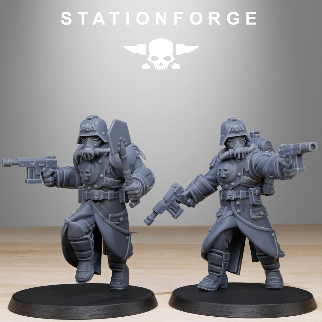 Two Grimguard Bombardiers miniatures in dynamic combat poses with sidearms, melee weapons, and rugged sci-fi armor.