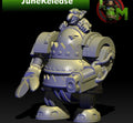 Guttertech Scrap Walker sci-fi goblin miniature by Trollet Miniatures, showing a goblin-piloted armored walker with mechanical arms and oversized weapons.